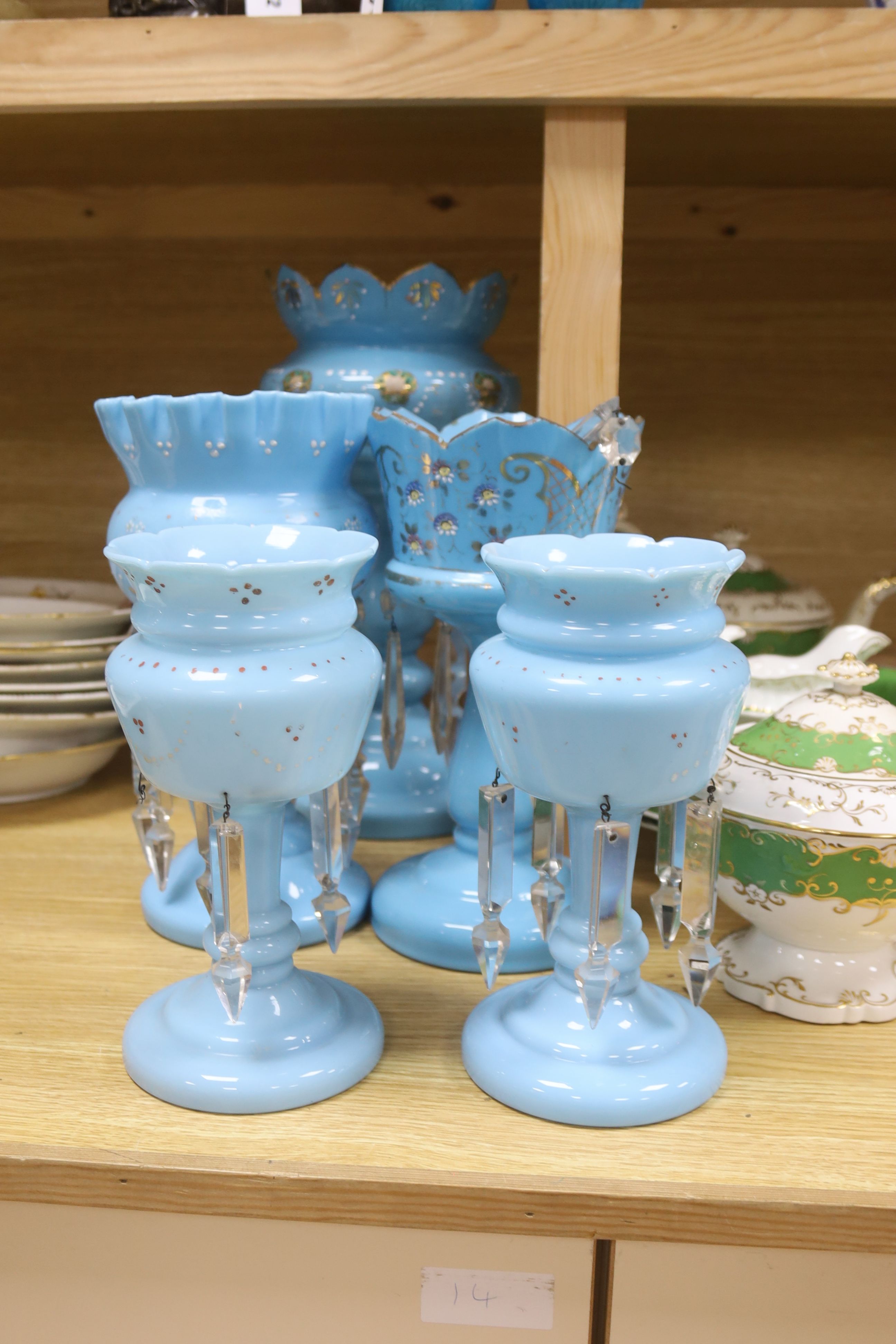 A matched set of five blue glass table lustres, 20th century, tallest 35cm